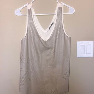 Tart grey leather shirt on front and cloth on bac